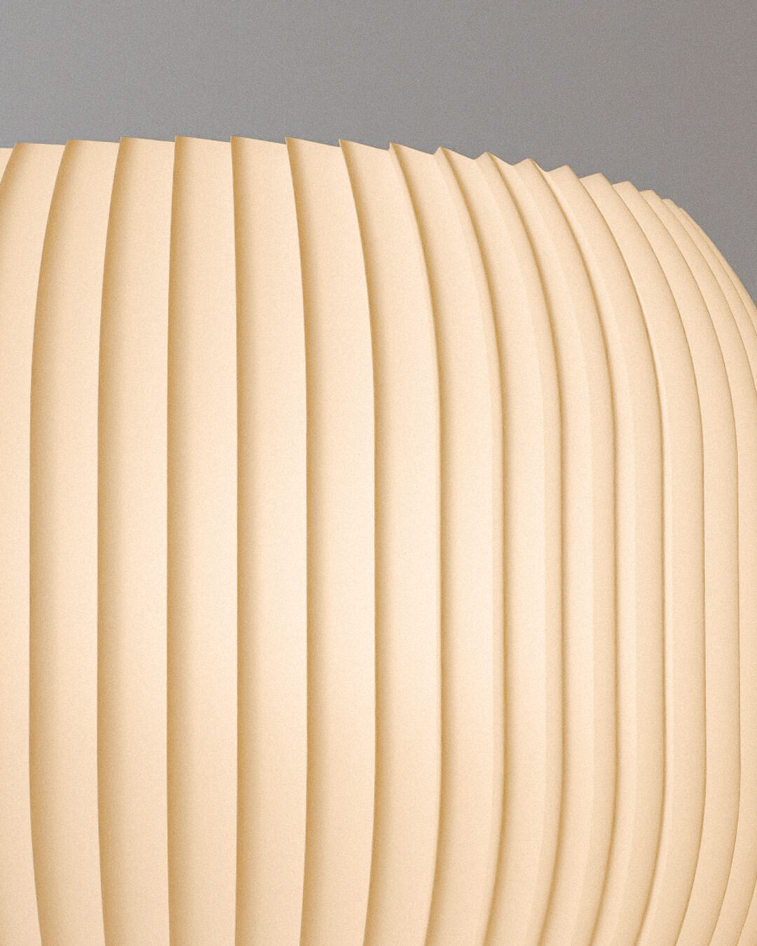 Detalhe do plissado impresso em 3D da luminária Selene acesa